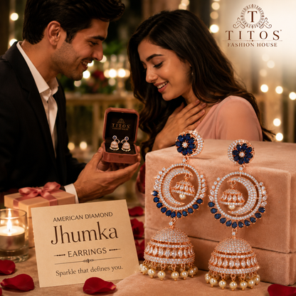 Couple admiring Titos diamond jhumka earrings with a romantic setting.