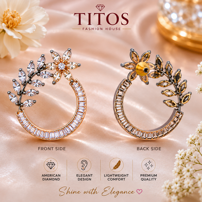 Gold hoop earrings with floral designs on a soft pink background, featuring TITOS Fashion House branding.
