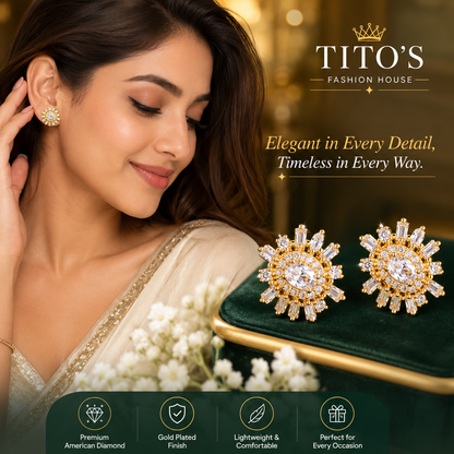 Elegant gold-plated American diamond stud earrings worn by a woman, featuring sparkling round-cut stones and baguette accents, showcased with a luxury jewelry display.