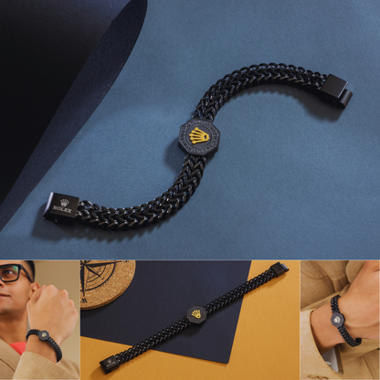 Black chain bracelet with a prominent brand logo on a blue background, with additional views of the bracelet on a person's wrist.