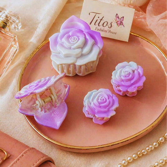 Pink rose-shaped hair clips on a pink plate with 'Titos' branding in the background.