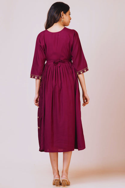 Elegant Maroon Embroidered Cotton Gown with Gold Motif