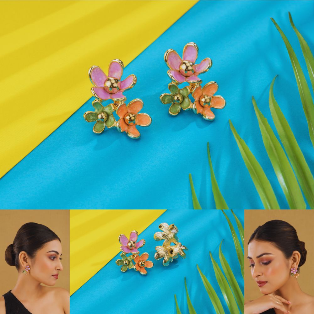 Colorful floral earrings on a blue and yellow background with a woman wearing them.
