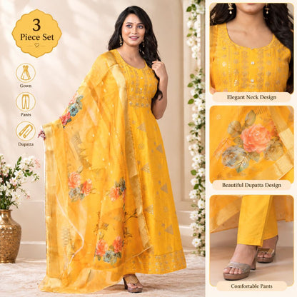 A woman models a three-piece mustard yellow ethnic suit set with a floral dupatta, paired with matching pants. The image includes three inset detail photos on the right showing the neckline, dupatta print, and pants fit, along with icons and text highlighting the 3-piece set features.