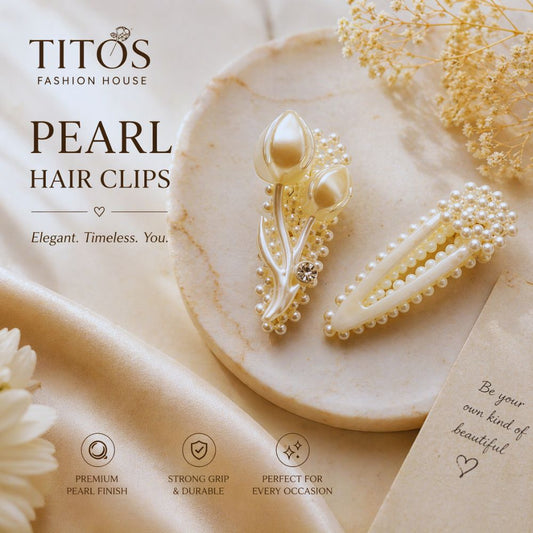 Pearl hair clips on a marble surface with flowers, featuring TITOS Fashion House branding.