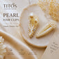 Pearl hair clips on a marble surface with flowers, featuring TITOS Fashion House branding.