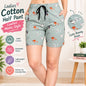 Women’s green cotton shorts with colorful bunny print, drawstring waist, side pockets, soft breathable fabric, casual homewear half pants.