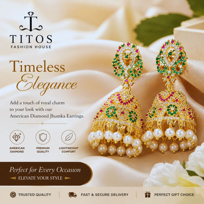 Gold and pearl earrings with gemstones on a soft fabric background, featuring TITOS Fashion House branding.