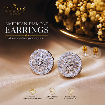 Diamond earrings on a beige fabric background with 'TITOS Fashion House' branding.