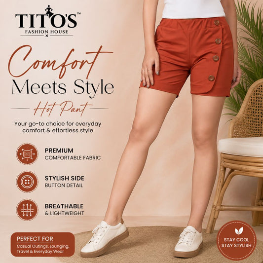 A model wearing rust-orange side-button comfort shorts from TITO'S FASHION HOUSE, shown from the waist down in a warm beige studio setting with promotional text overlays.