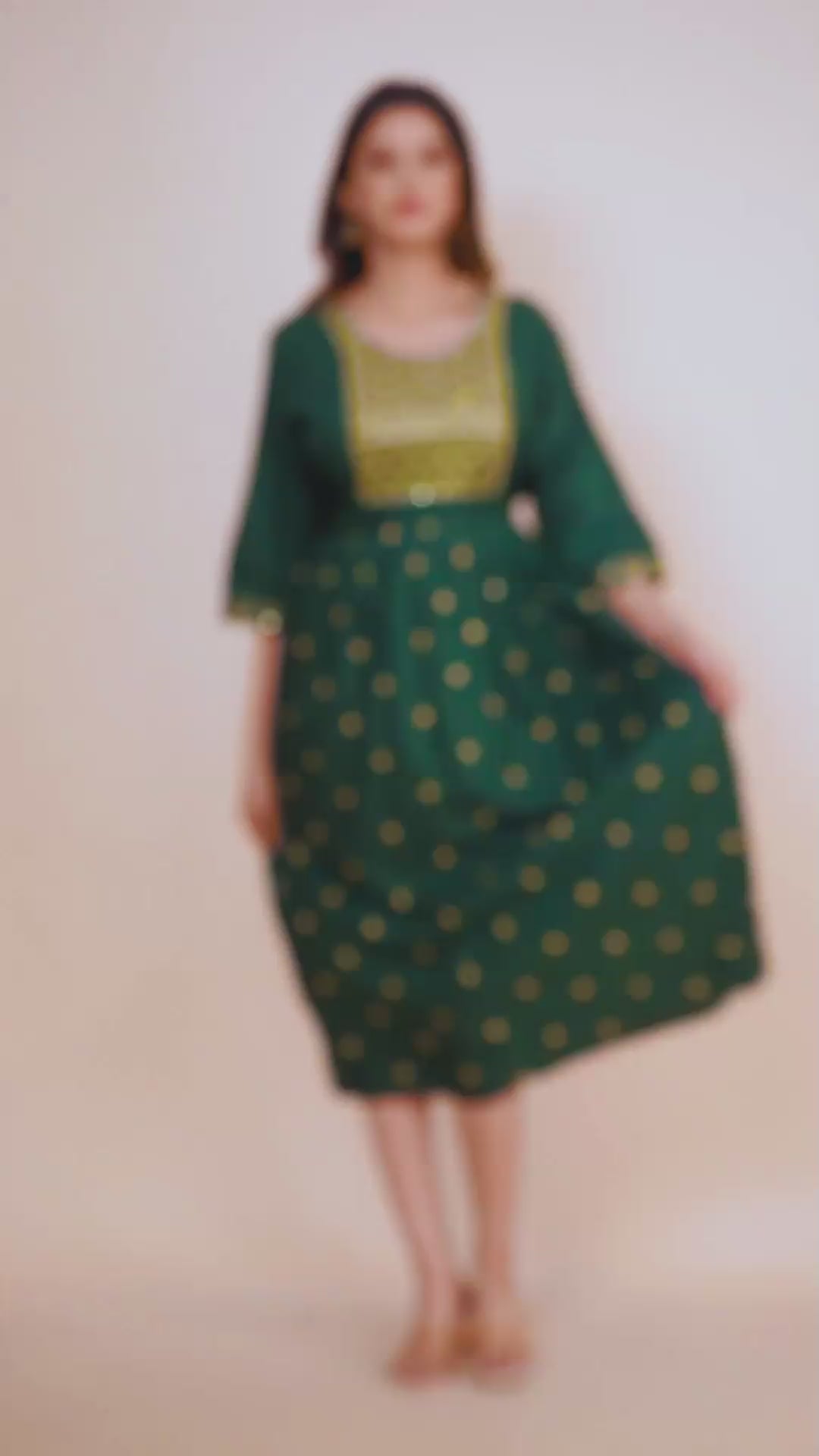 Elegant Green Embroidered Cotton Gown with Gold Motif