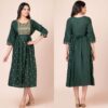 a woman in a green dress