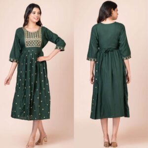 a woman in a green dress